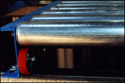 Rollerflo conveyors utilizes hysteresis control principle of Kornylak's Palletflo gravity conveying system to handle a wide variety of sizes and shapes of loads with different chimes, or loads on narrow-runner skids.