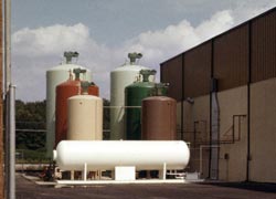 These are bulk chemical storage tanks. Click to enlarge.