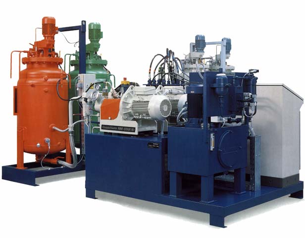 Shown here are two day tanks along with a urethane metering and dispensing unit.