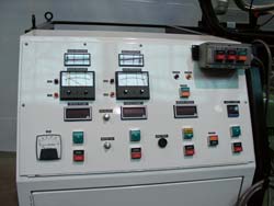 This is a close up of the control console with a stowed remote control unit.