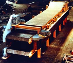 This flexible foaming conveyor manufactures carpet underlayment called rebond.