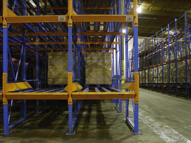Steel Palletflo wheels are used on the pallet entry rail to withstand the abuse of pallet loading.