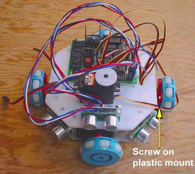 This robot uses a plastic spindle mounted to a Transwheel.