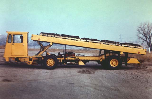 The low-lift Karry-All has the ability to lift the front or rear part of the cargo deck.