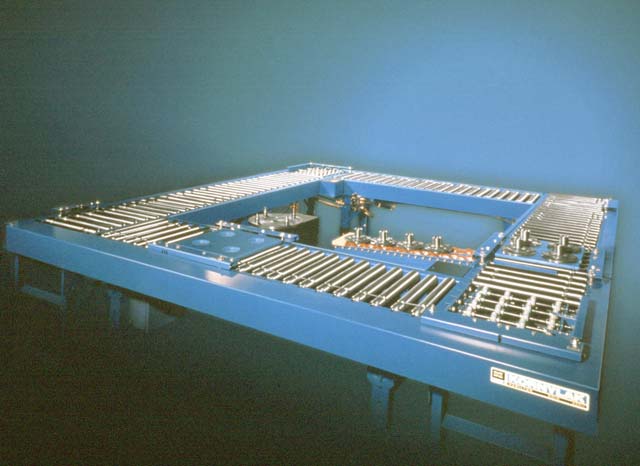 This is a powered TS Live Roller Conveyor with Transwheel powered transfer used with robots.